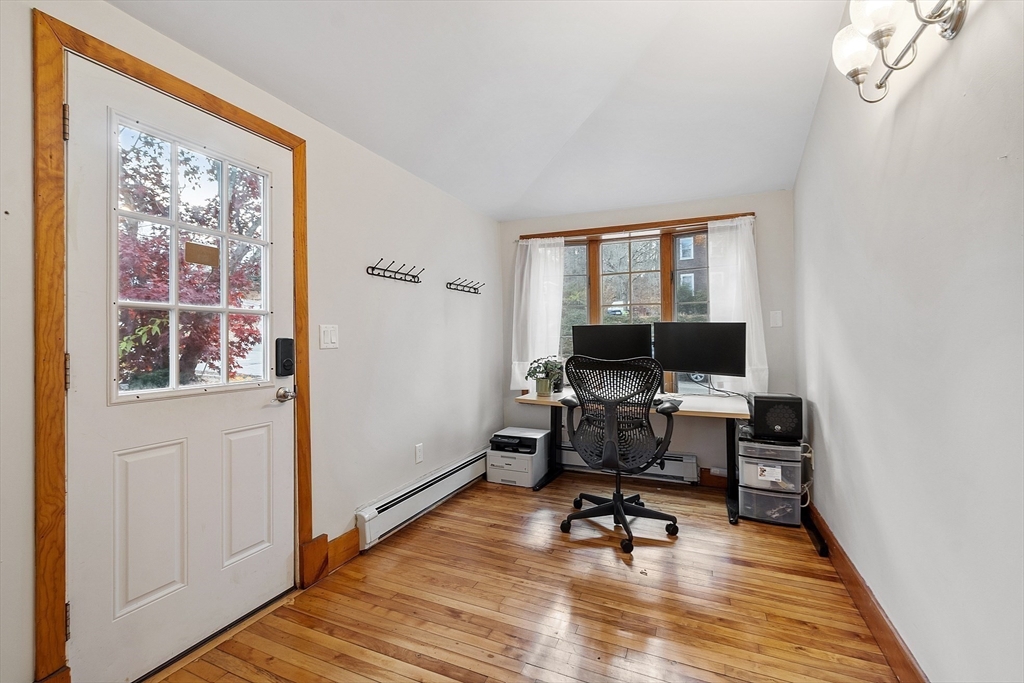24 Myrtle Avenue Wakefield, MA 01880 - Photo 25 of 39 a view of a workspace with furniture and a window