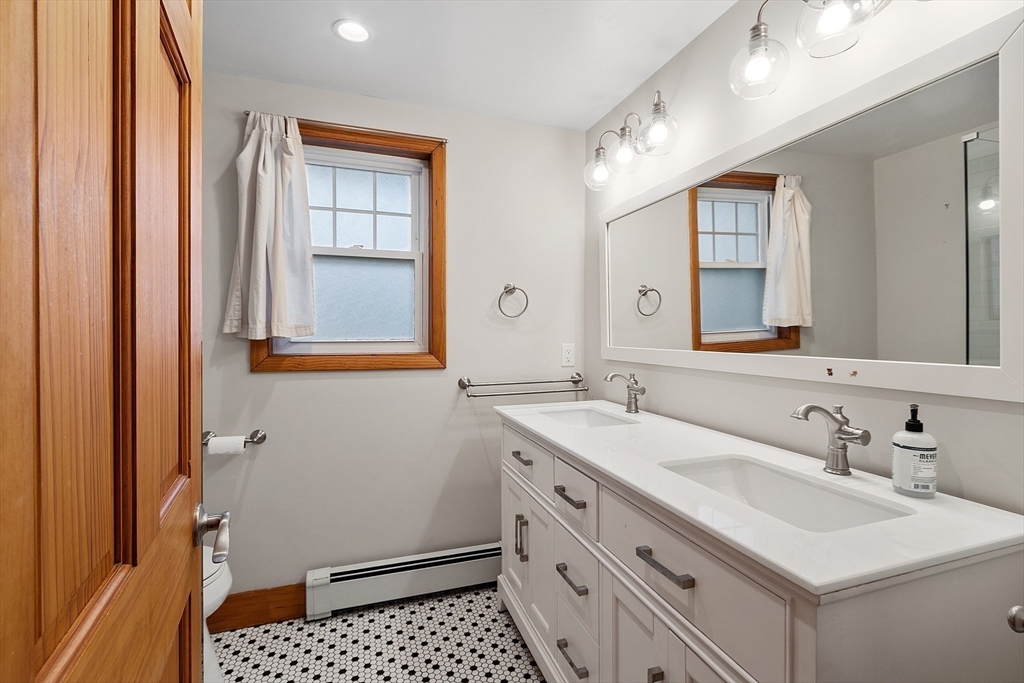 24 Myrtle Avenue Wakefield, MA 01880 - Photo 27 of 39 a bathroom with a sink and a mirror
