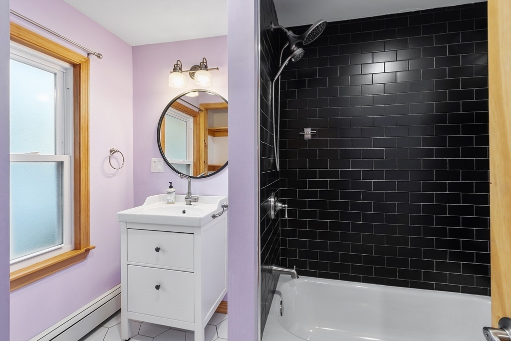 24 Myrtle Avenue Wakefield, MA 01880 - Photo 30 of 39 a bathroom with a sink a toilet and shower