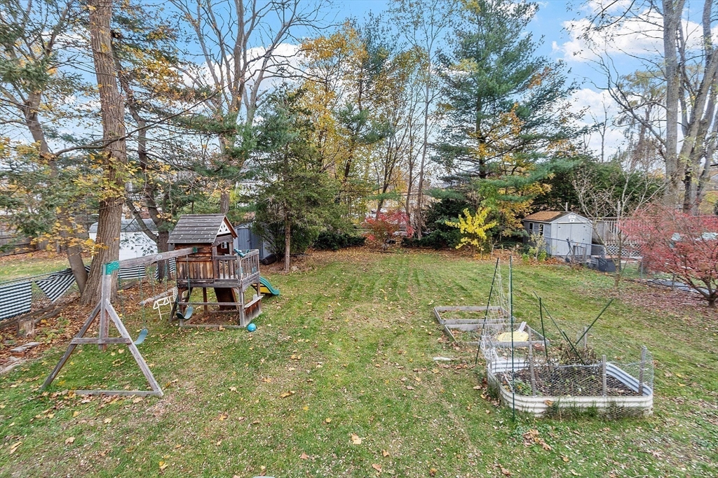 24 Myrtle Avenue Wakefield, MA 01880 - Photo 34 of 39 a backyard of a house with table and chairs
