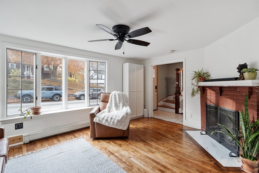 24 Myrtle Avenue Wakefield, MA 01880 - Photo 4 of 39 a living room with furniture and a flat screen tv