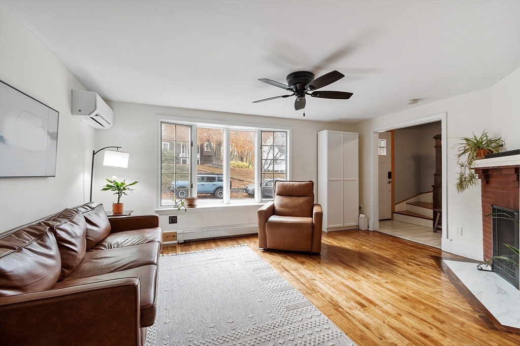 24 Myrtle Avenue Wakefield, MA 01880 - Photo 6 of 39 a living room with furniture and a large window