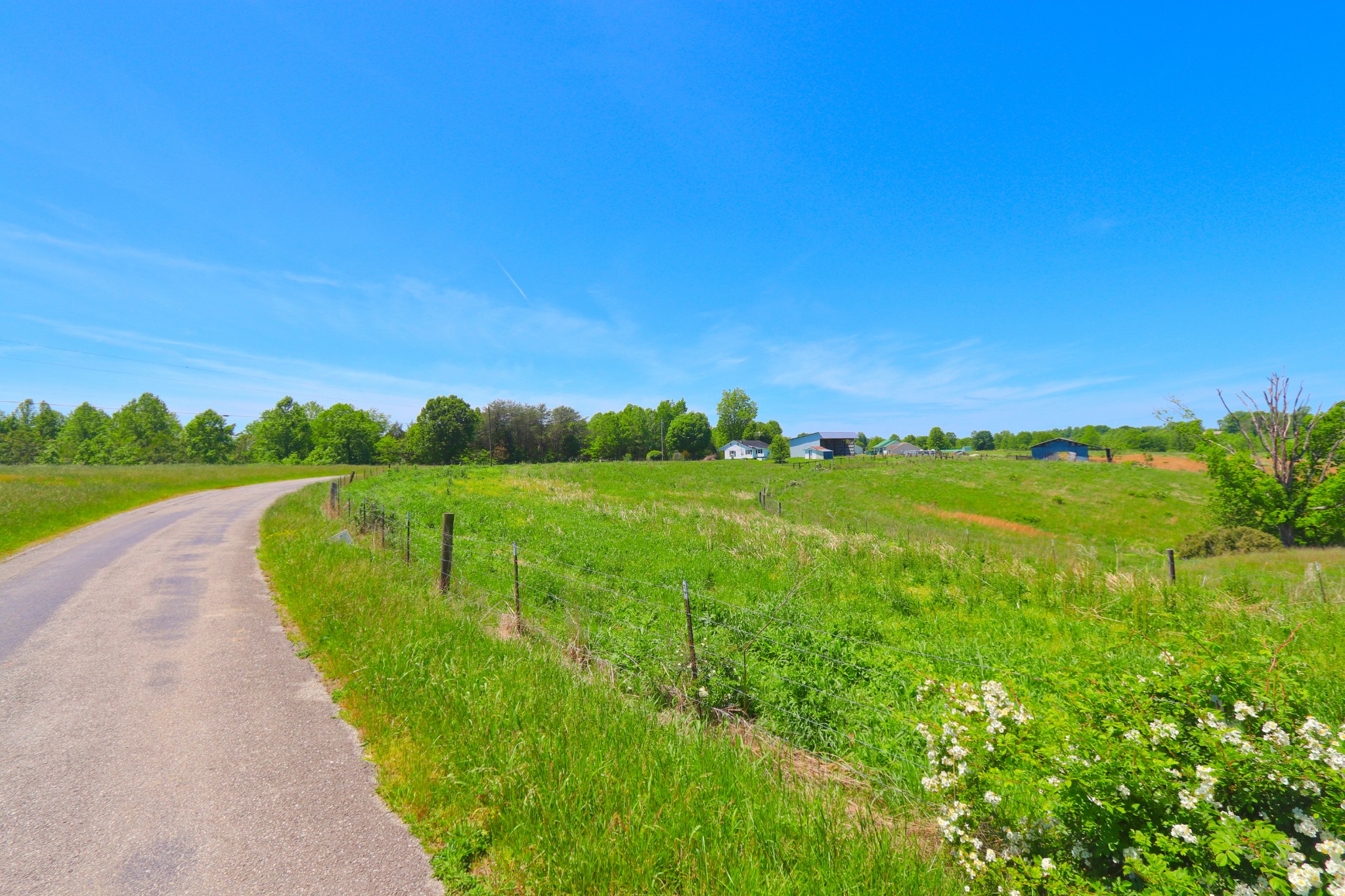 783 Rose Hill Road Red Boiling Springs, TN 37150 - Photo 6 of 6 a view of a river and garden with ocean