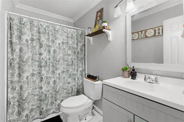 a bathroom with a sink and a toilet