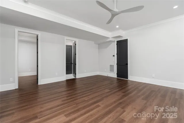 a table and chairs sitting in front of a house