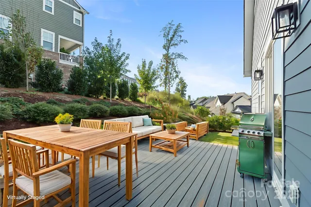 a view of balcony with wooden floor and outdoor space