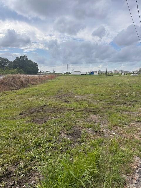 1100 Eloise Loop Road Winter Haven, FL 33884 - Photo 5 of 8 a view of a field with an outdoor space