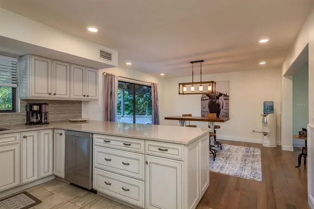 a view of a workspace with furniture