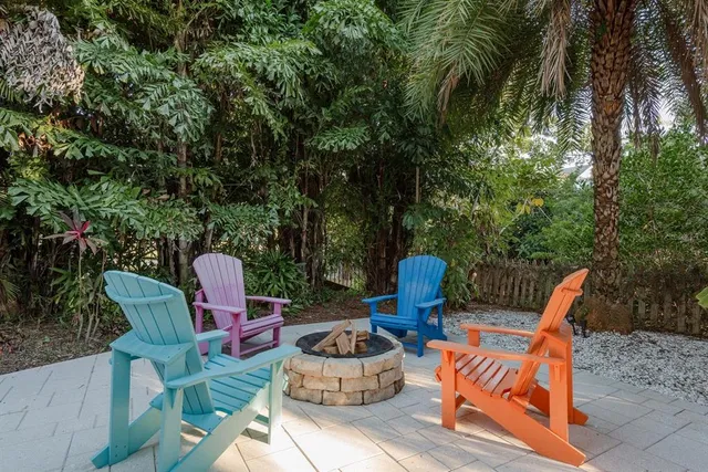 a bedroom with a bed and a television