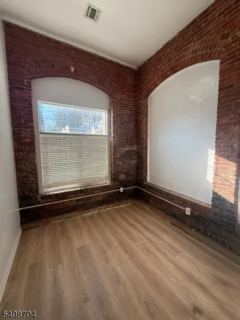 a view of a room with windows