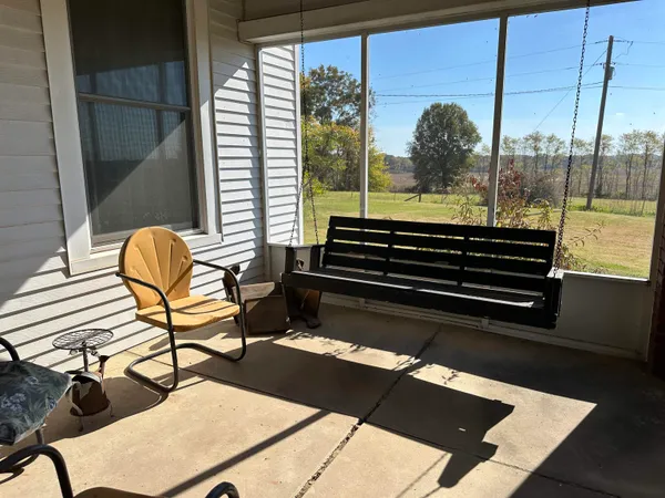 a view of a floor to ceiling window and a table
