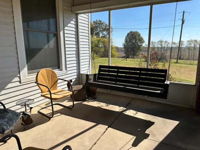 a view of a floor to ceiling window and a table