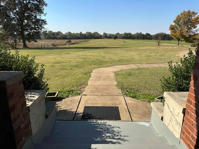 a view of a lake with a outdoor space