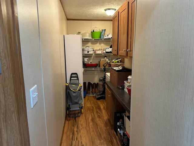 a view of a closet with storage