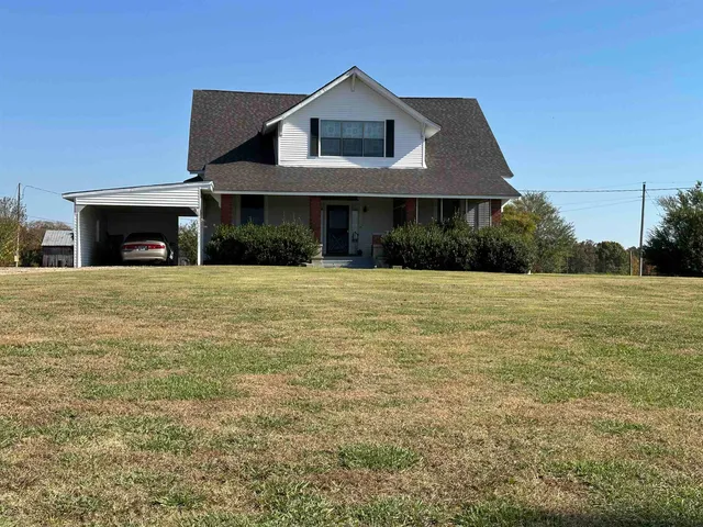 a house view with a garden space