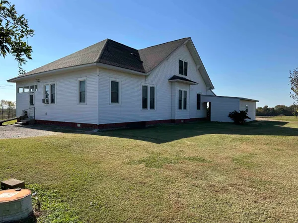 a house view with a garden space