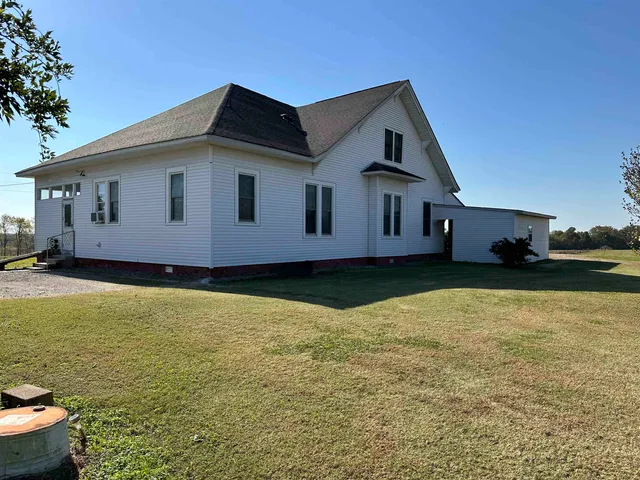 a house view with a garden space