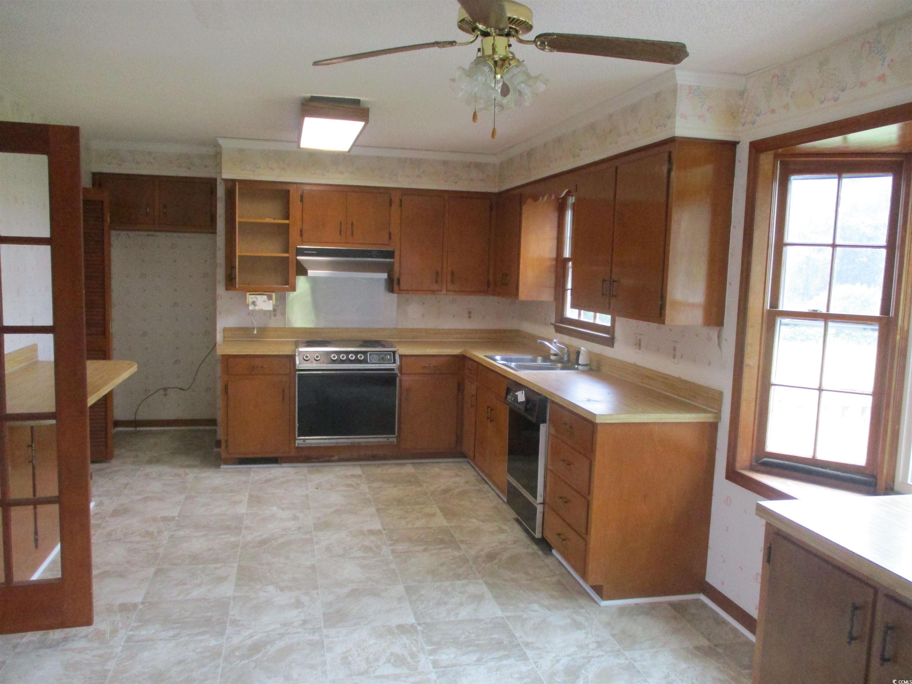 8110 Elvington Road Nichols, SC 29581 - Photo 9 of 17 Kitchen with dishwasher, a wealth of natural light