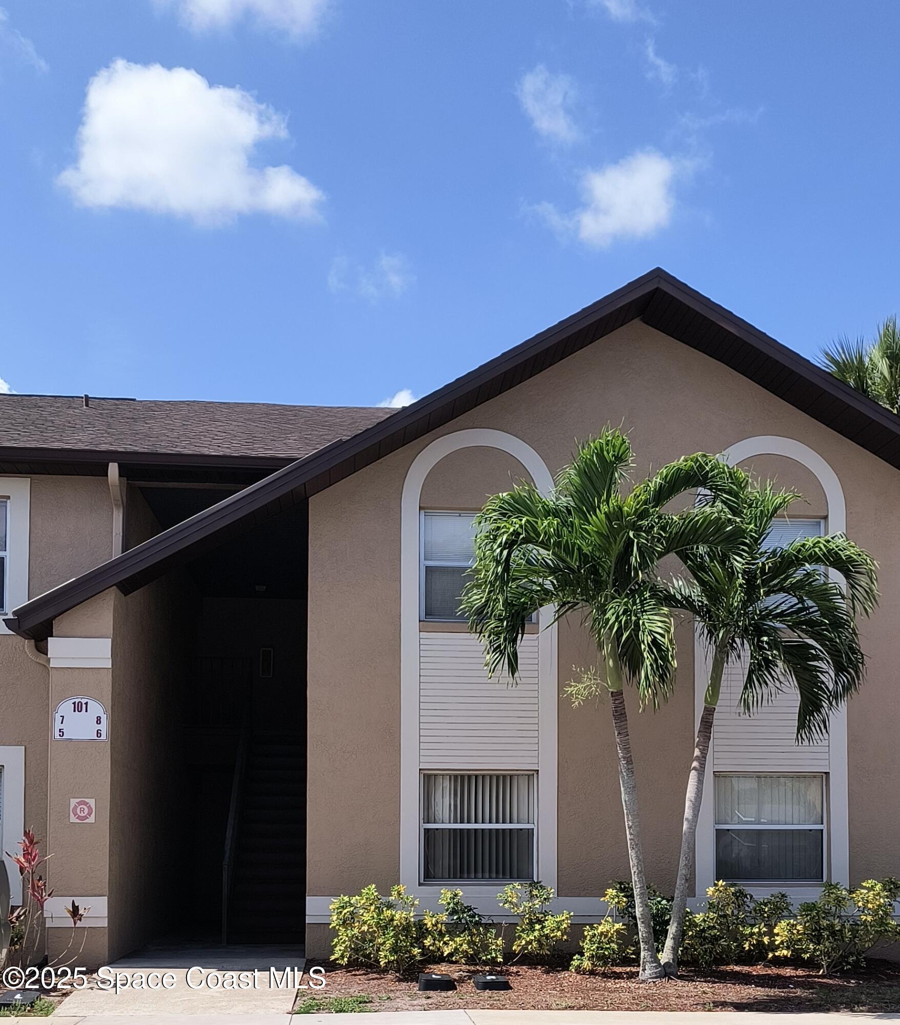 101 Summer Place, Unit 6 Merritt Island, FL 32953 - Photo 1 of 28 a front view of house with yard and green space