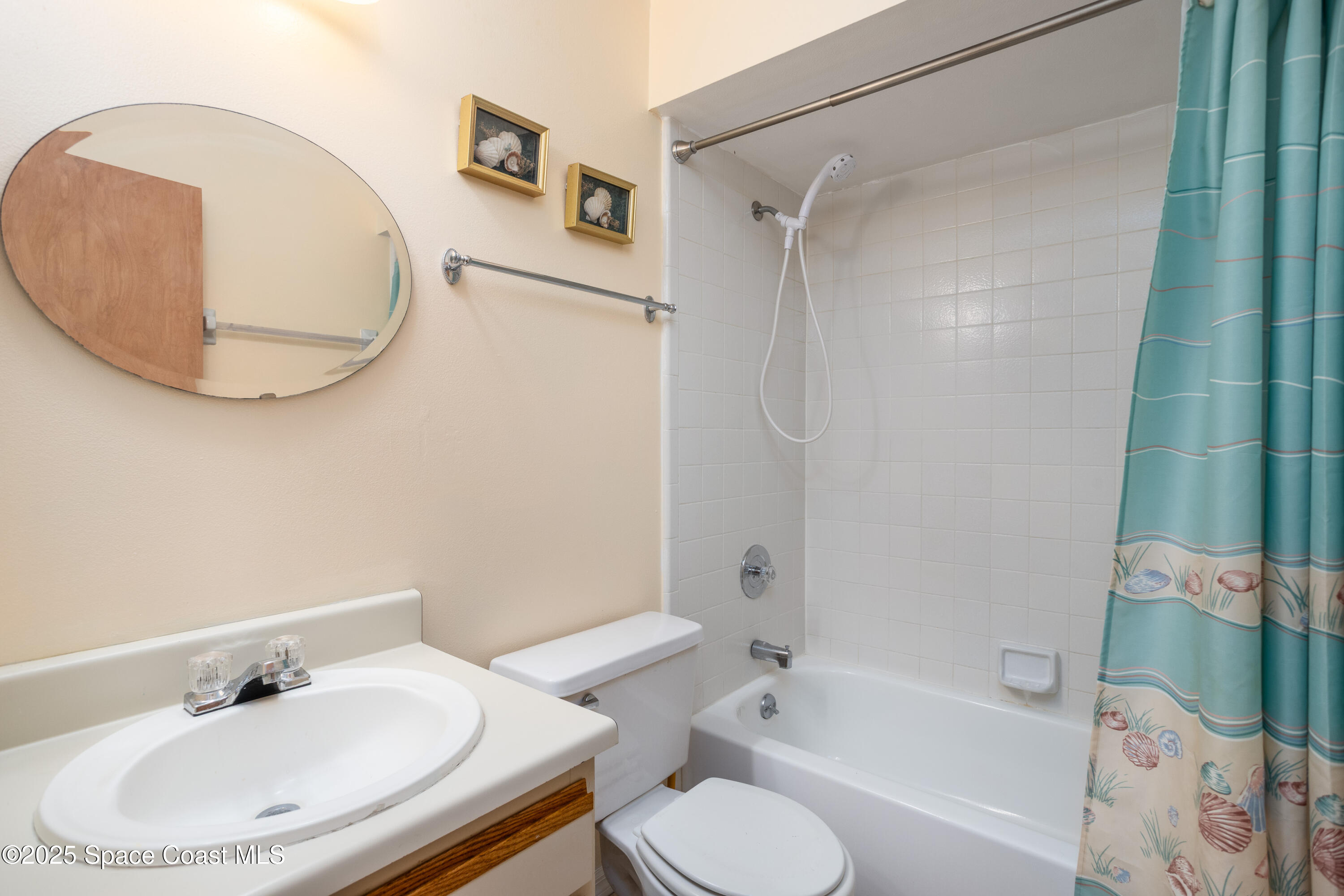 101 Summer Place, Unit 6 Merritt Island, FL 32953 - Photo 19 of 28 a bathroom with a sink toilet and a bathtub