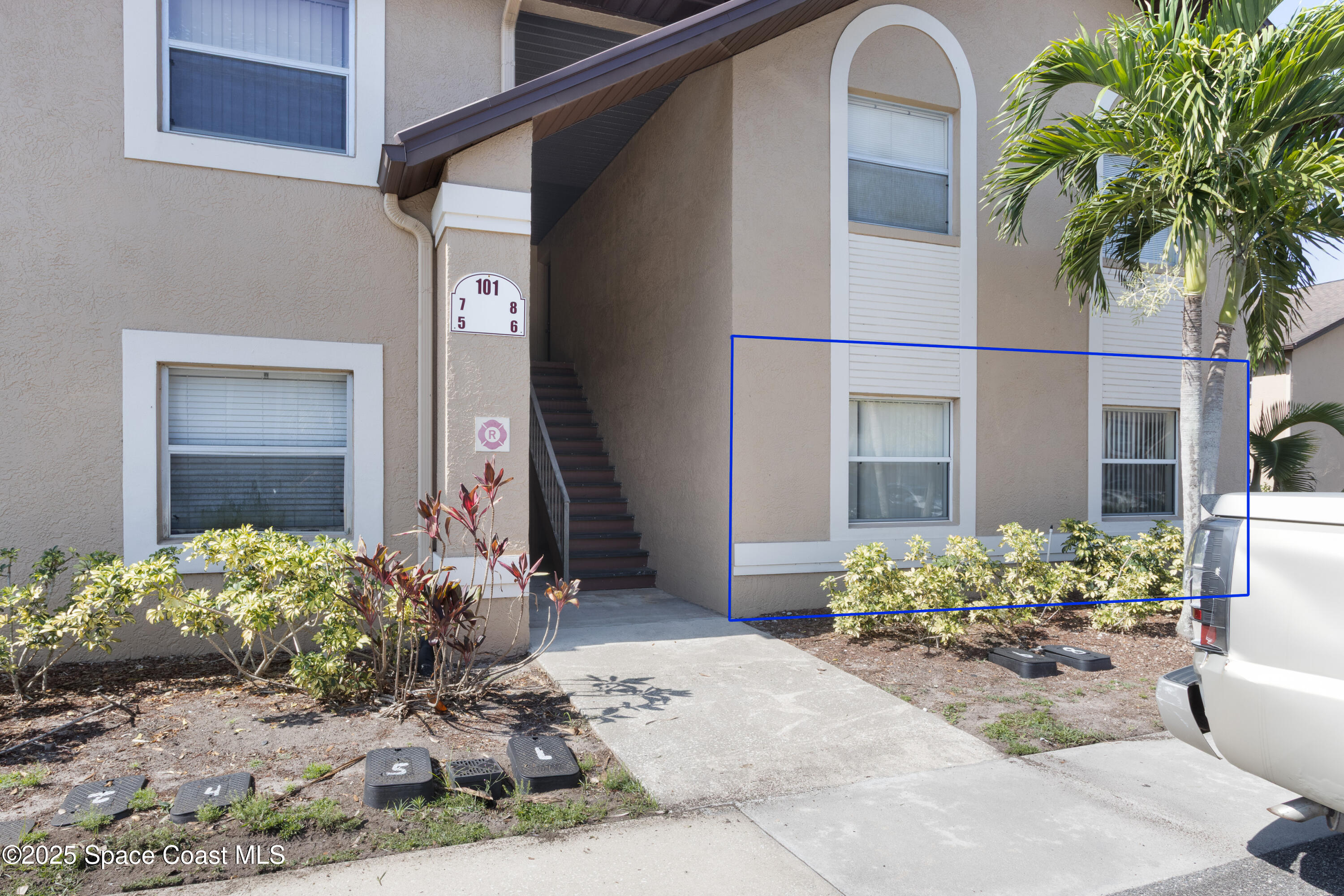 101 Summer Place, Unit 6 Merritt Island, FL 32953 - Photo 2 of 28 a front view of a house
