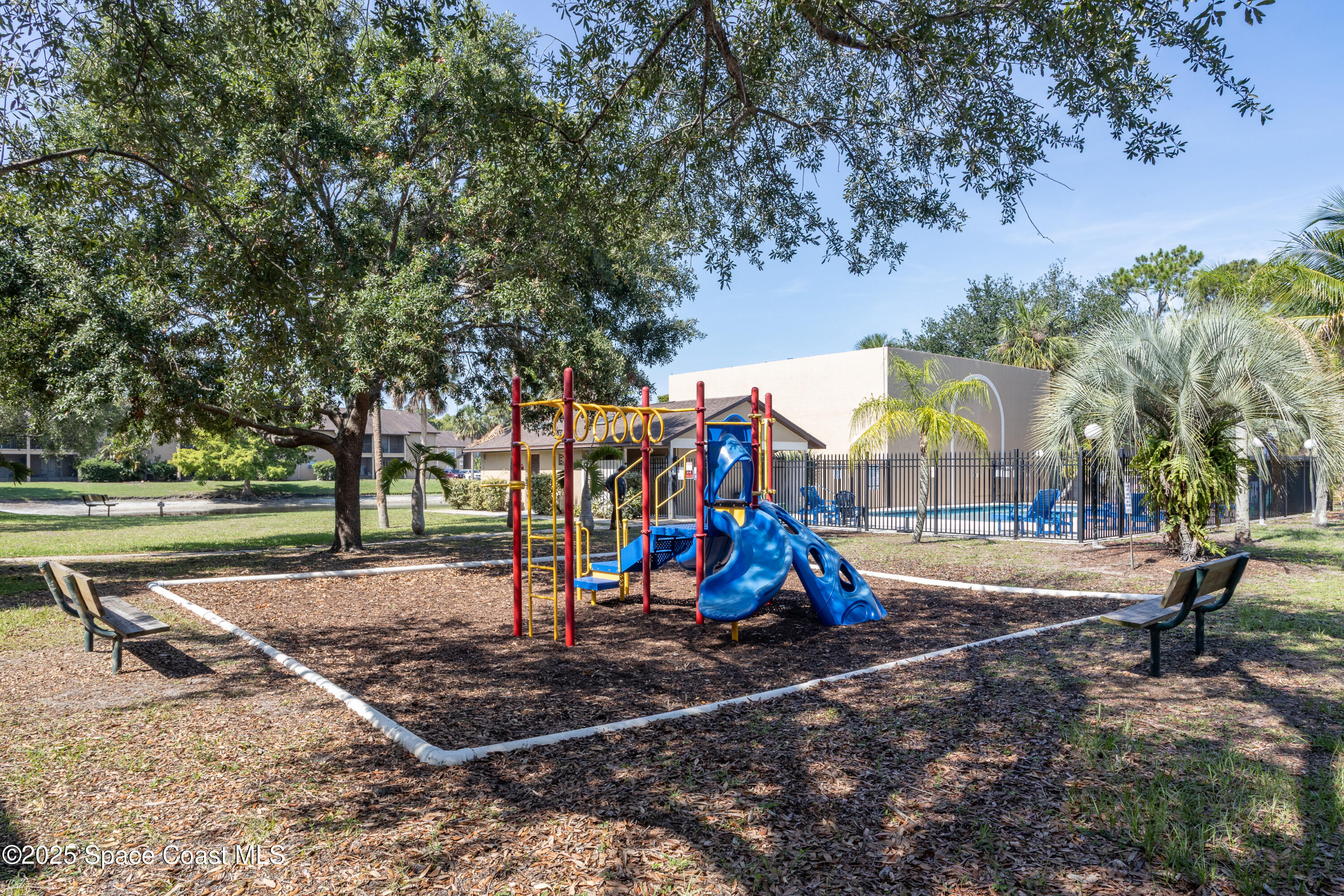 101 Summer Place, Unit 6 Merritt Island, FL 32953 - Photo 23 of 28 a view of a park with slide