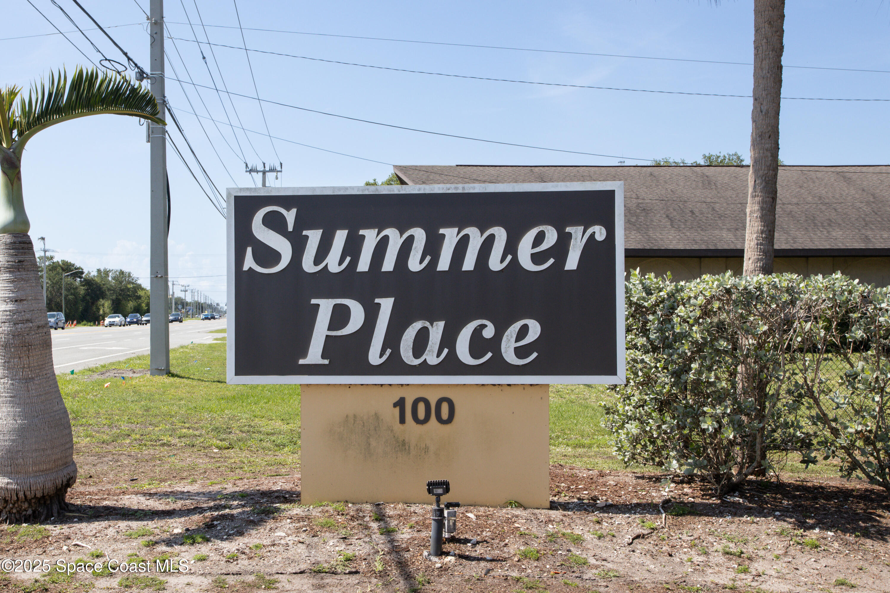 101 Summer Place, Unit 6 Merritt Island, FL 32953 - Photo 28 of 28 a sign broad on the wooden wall