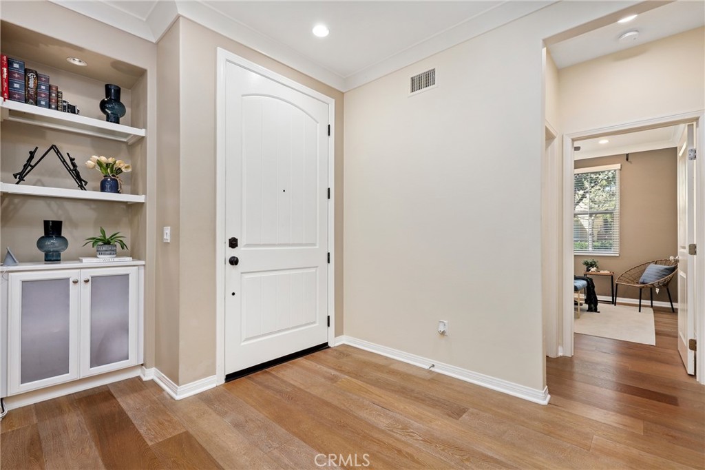 24 Lacebark, Unit 48 Irvine, CA 92618 - Photo 14 of 42 a view of empty room with wooden floor
