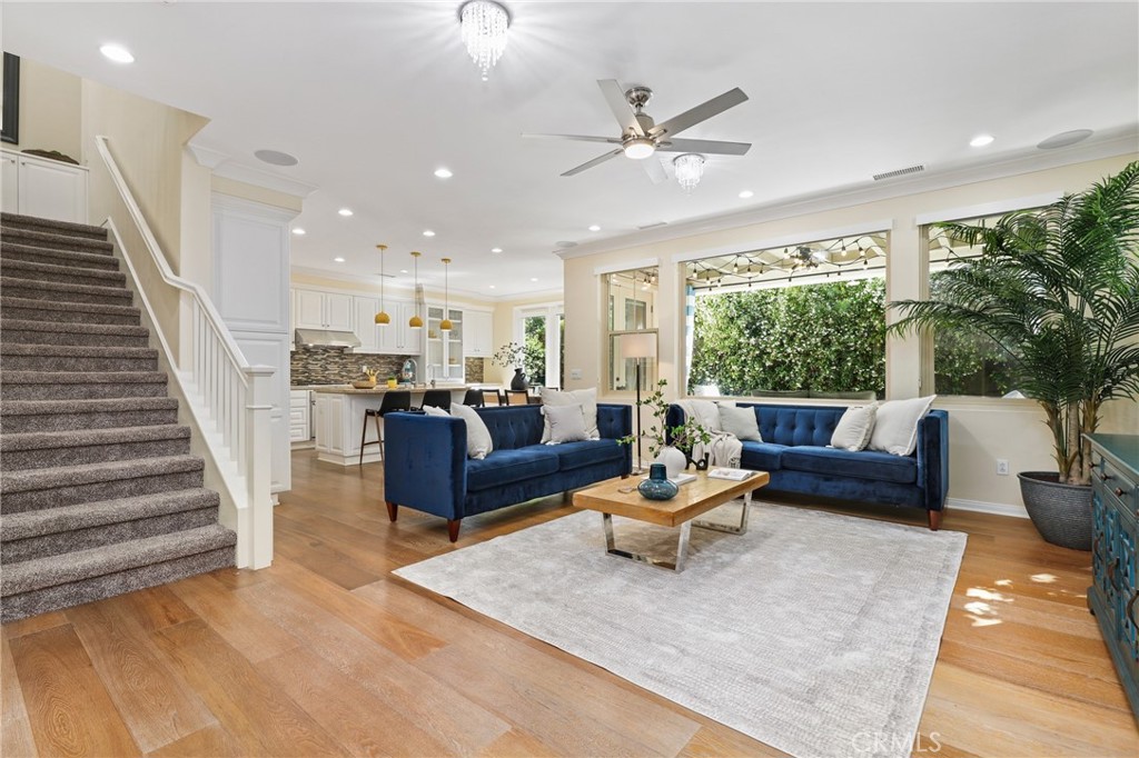 24 Lacebark, Unit 48 Irvine, CA 92618 - Photo 3 of 42 a living room with furniture and a large window