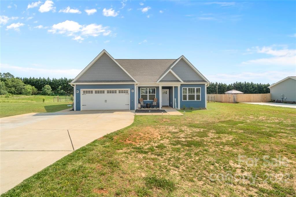 3269 Evondale Road Crouse, NC 28033 - Photo 1 of 36 a house view with a garden space