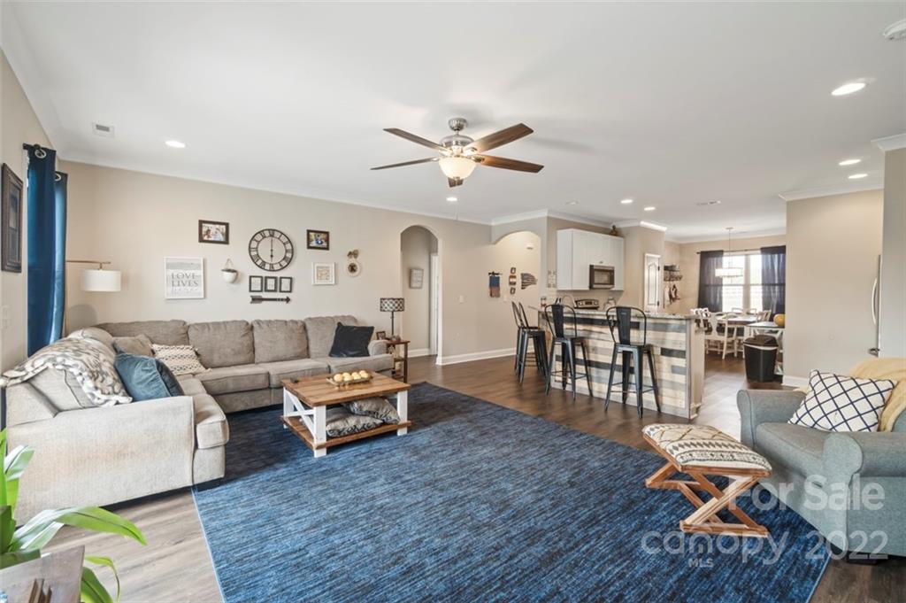 3269 Evondale Road Crouse, NC 28033 - Photo 13 of 36 a living room with furniture kitchen view and a wooden floor