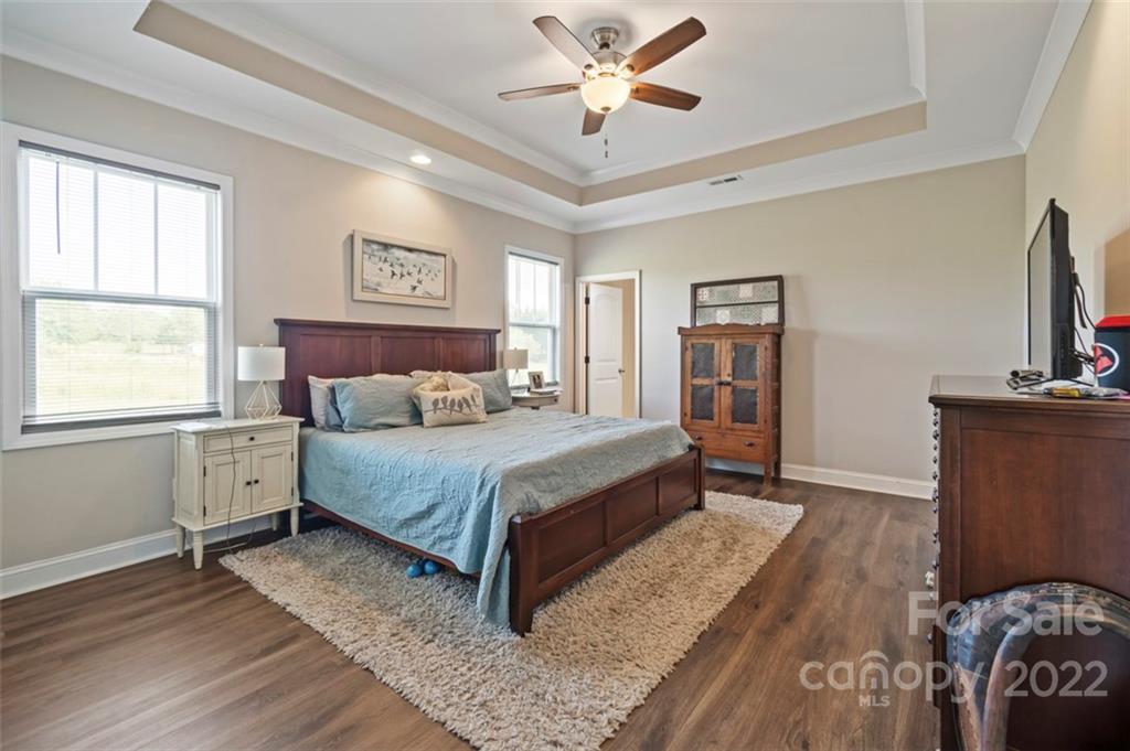 3269 Evondale Road Crouse, NC 28033 - Photo 18 of 36 a bedroom with a bed and a flat screen tv