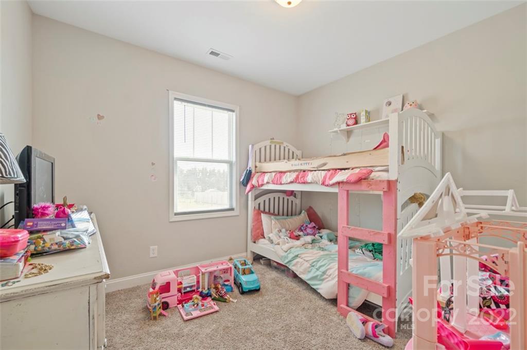 3269 Evondale Road Crouse, NC 28033 - Photo 25 of 36 a bedroom with a bed and a window