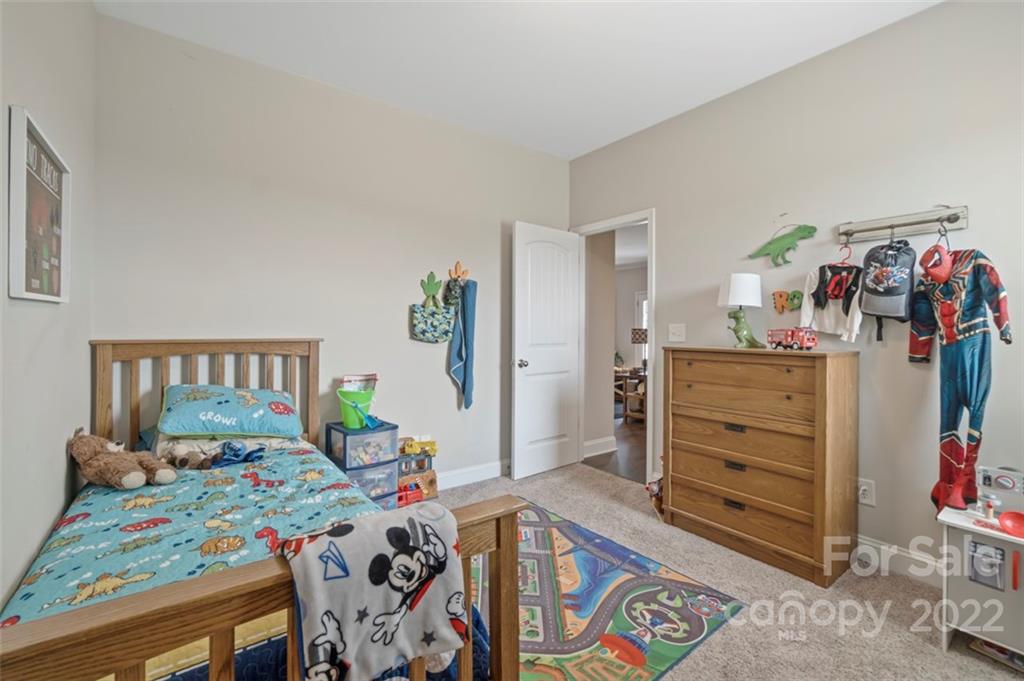 3269 Evondale Road Crouse, NC 28033 - Photo 28 of 36 a bedroom with a bed and wooden floor