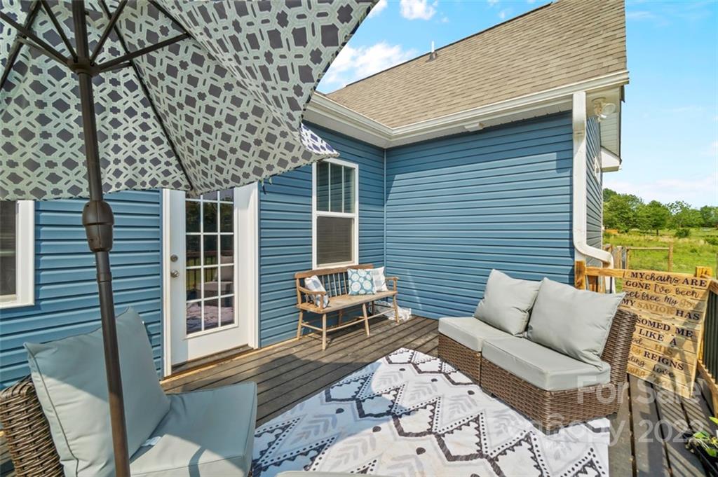 3269 Evondale Road Crouse, NC 28033 - Photo 31 of 36 a balcony with furniture and a potted plant