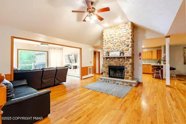 a bedroom with a bed and a table in it