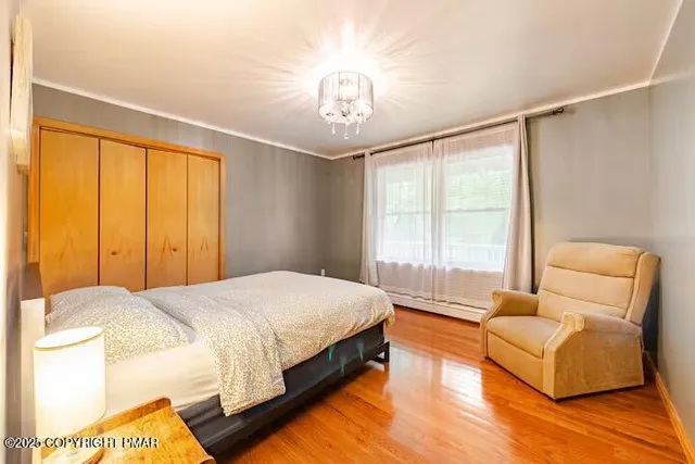 a spacious bathroom with a double vanity sink a mirror and a