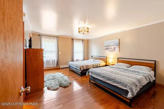 a bathroom with a sink a mirror and a shower