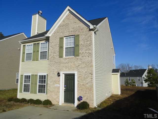 3441 Ferdilah Lane Raleigh, NC 27610 - Photo 1 of 12 a front view of a house with a yard