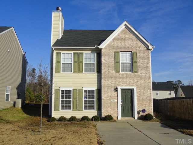 3441 Ferdilah Lane Raleigh, NC 27610 - Photo 12 of 12 a front view of a house with a yard