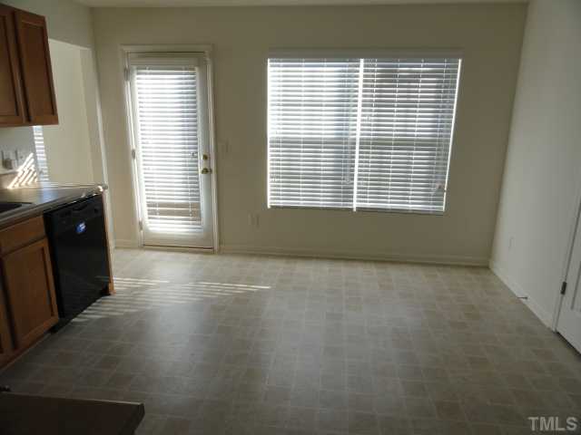 3441 Ferdilah Lane Raleigh, NC 27610 - Photo 4 of 12 a view of an empty room with a window