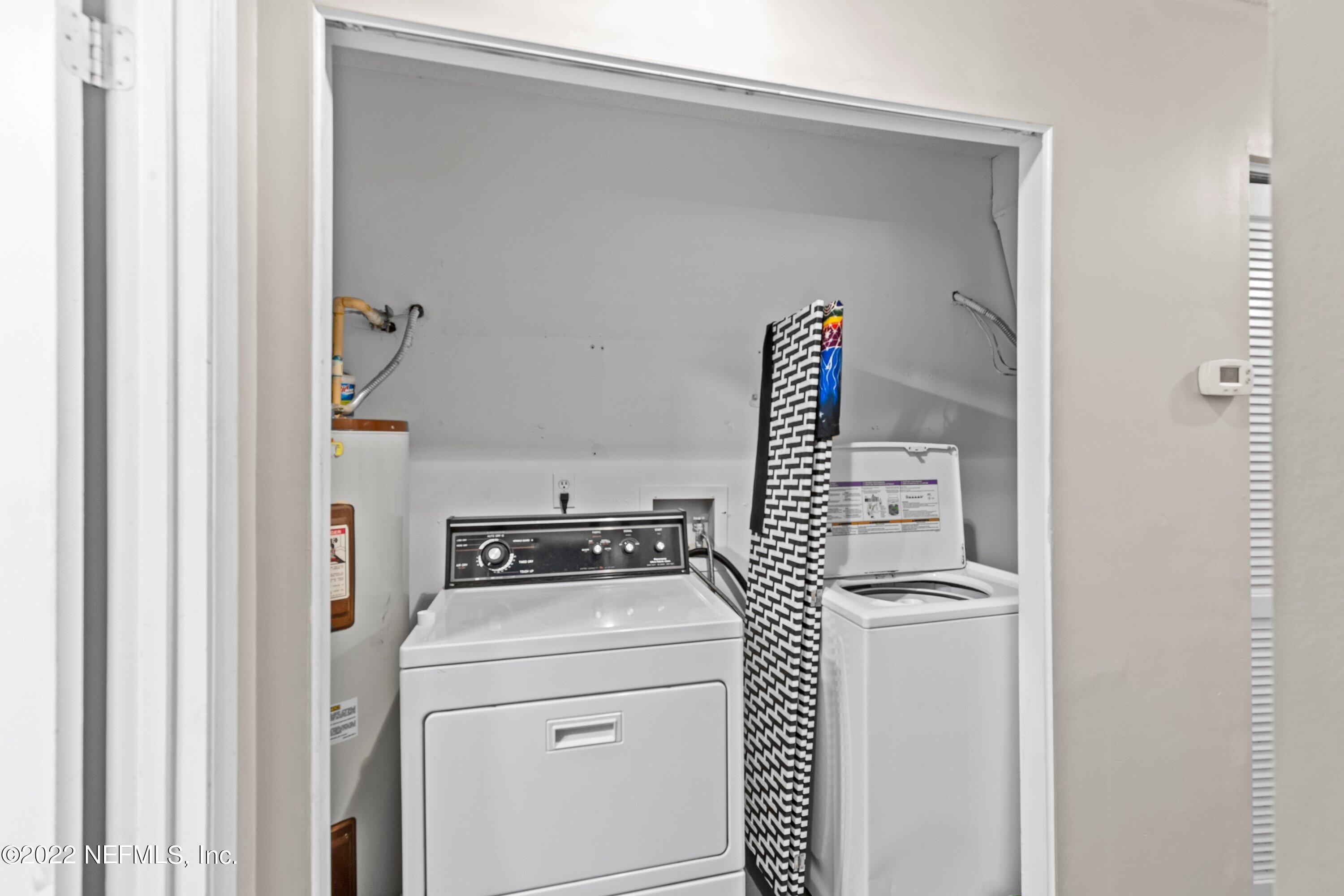 3801 Crown Point Road, Unit 2214 Jacksonville, FL 32257 - Photo 17 of 27 a utility room with dryer and washer