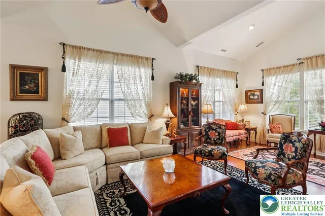 a bed room with furniture and a rug