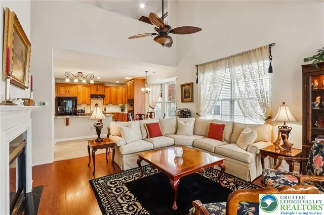 a bedroom with a bed dresser and a window