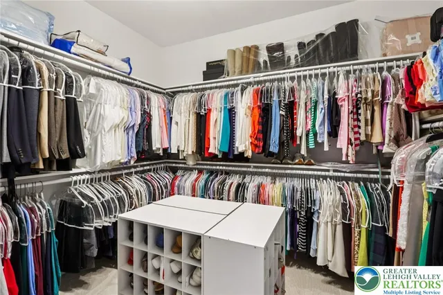 a bathroom with a shower and a sink