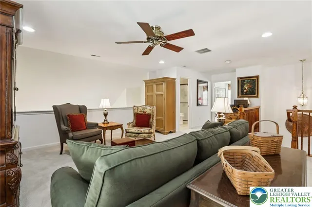 a view of a livingroom with furniture and wooden floor