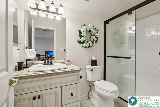 a view of a chairs and table in a patio