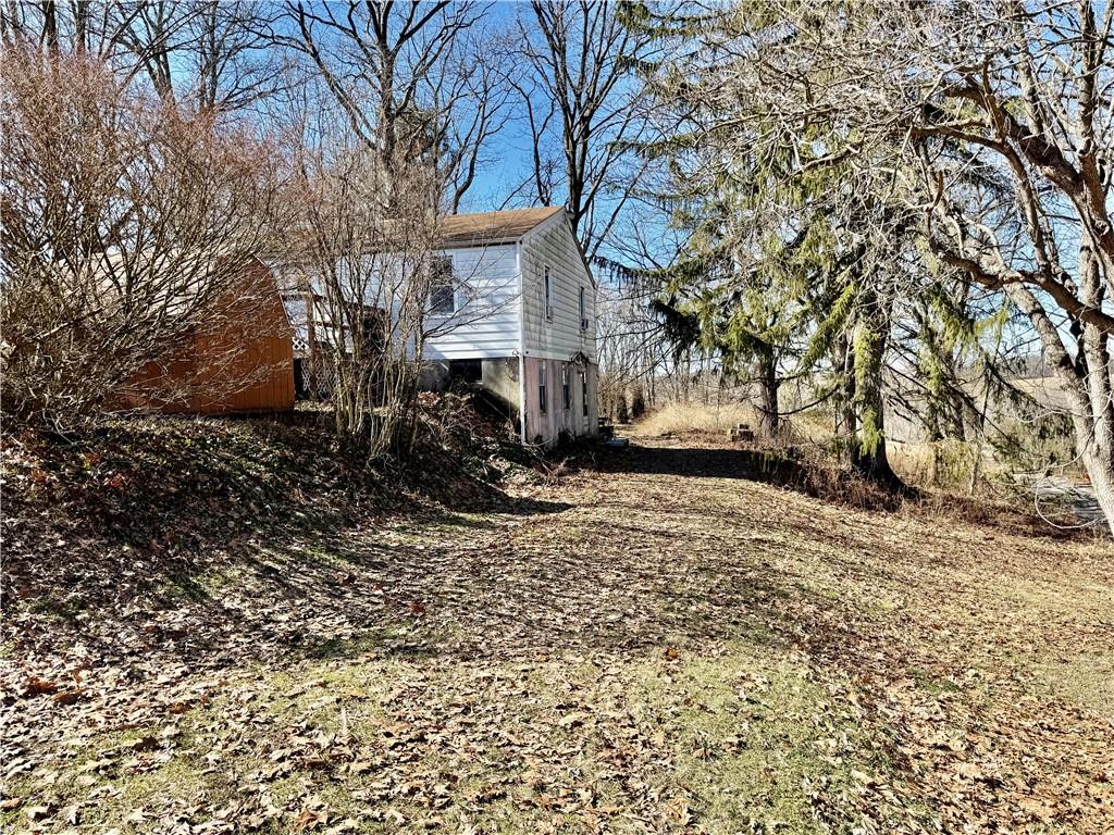 701 Chicora Road Chicora, PA 16025 - Photo 4 of 15 a view of a house with a yard