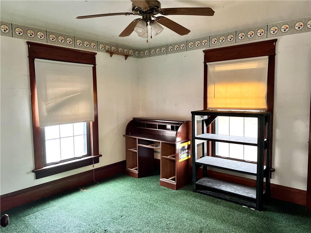 3738 Ellwood Road New Castle, PA 16101 - Photo 12 of 27 a view of an empty room with a window