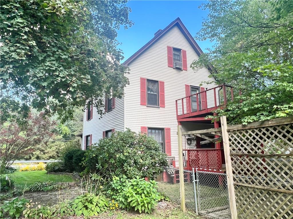 3738 Ellwood Road New Castle, PA 16101 - Photo 23 of 27 a view of a house with a yard